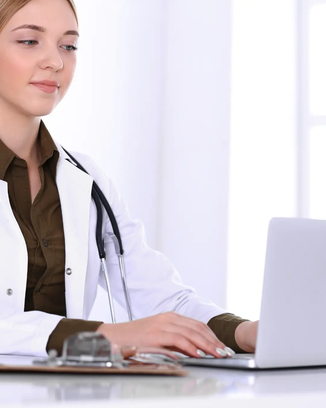 Doctor using her laptop